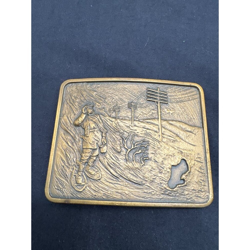Vintage O.C. Tanner Brass Belt Buckle Engraved Winter Lineman Snowshoe Scene